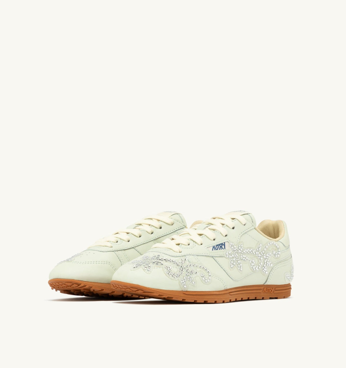 Woman WINDSPIN SNEAKERS IN BONE WHITE LEATHER WITH DECORATIONS