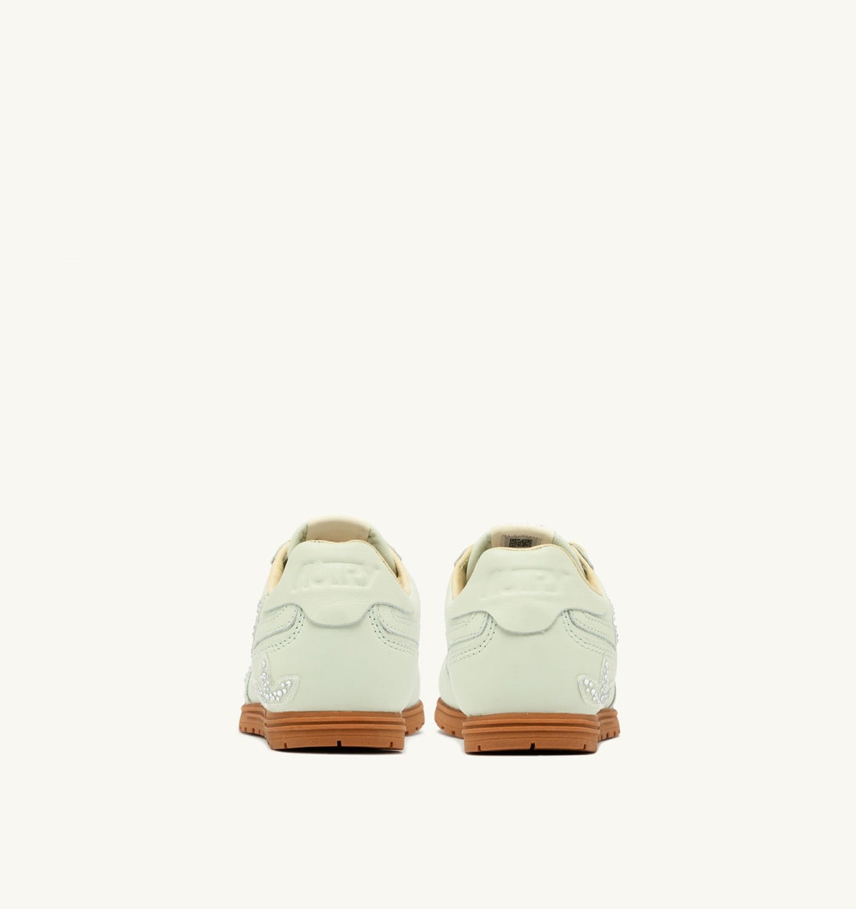 Woman WINDSPIN SNEAKERS IN BONE WHITE LEATHER WITH DECORATIONS
