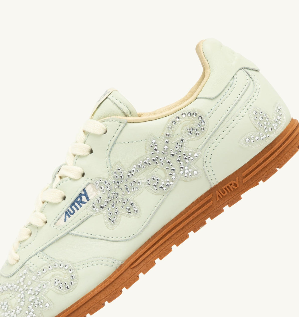 Woman WINDSPIN SNEAKERS IN BONE WHITE LEATHER WITH DECORATIONS