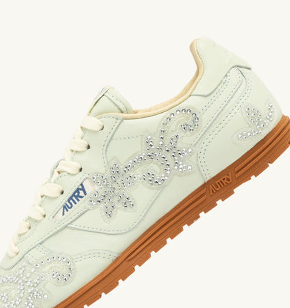 Woman WINDSPIN SNEAKERS IN BONE WHITE LEATHER WITH DECORATIONS