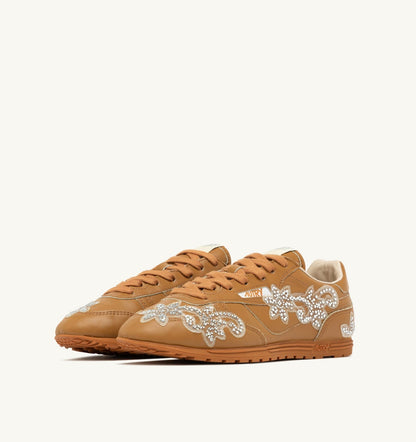 Woman WINDSPIN SNEAKERS IN EARTH LEATHER WITH DECORATIONS