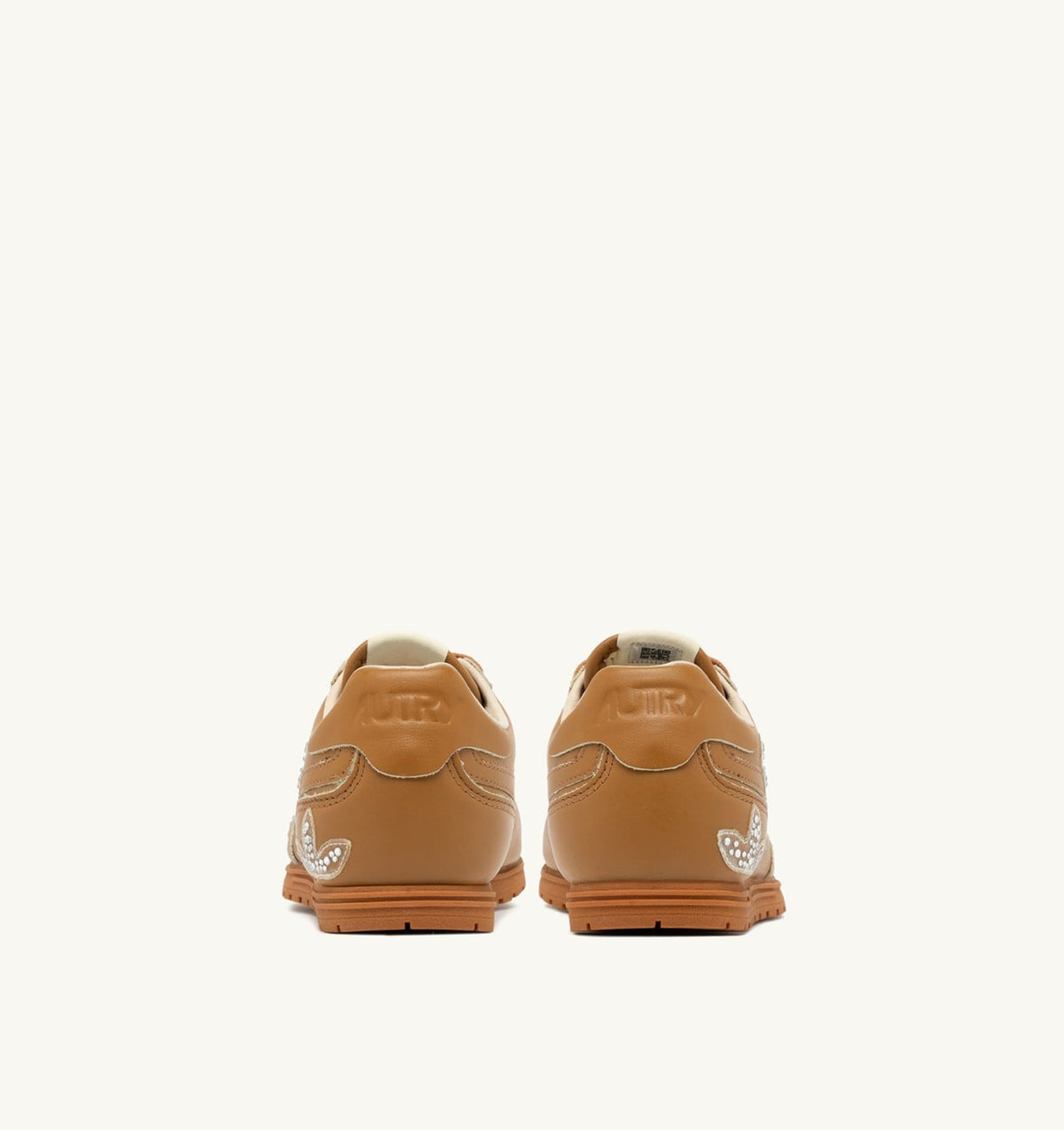 Woman WINDSPIN SNEAKERS IN EARTH LEATHER WITH DECORATIONS
