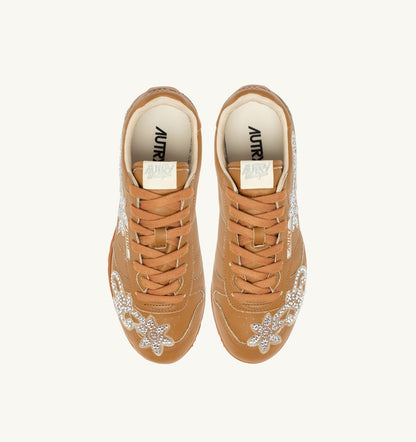 Woman WINDSPIN SNEAKERS IN EARTH LEATHER WITH DECORATIONS