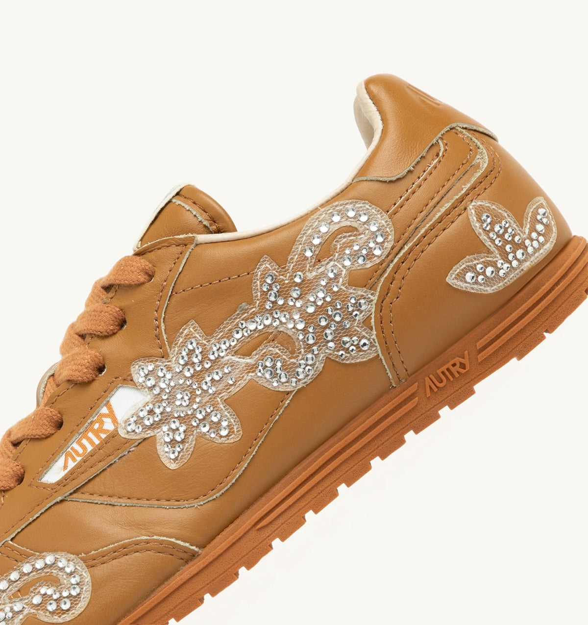 Woman WINDSPIN SNEAKERS IN EARTH LEATHER WITH DECORATIONS