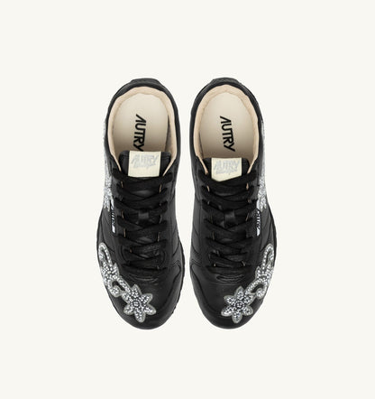 Woman WINDSPIN SNEAKERS IN BLACK LEATHER WITH DECORATIONS