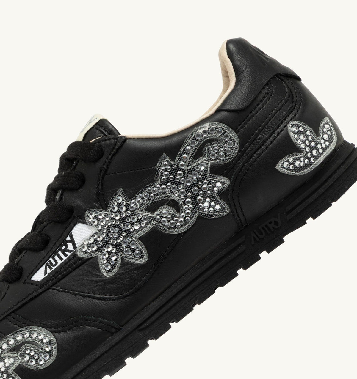Woman WINDSPIN SNEAKERS IN BLACK LEATHER WITH DECORATIONS