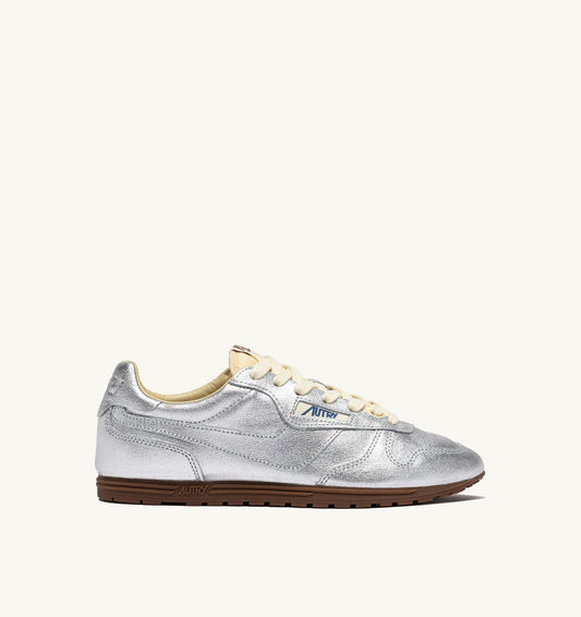 Woman WINDSPIN SNEAKERS IN SILVER TONE LAMINATED LEATHER