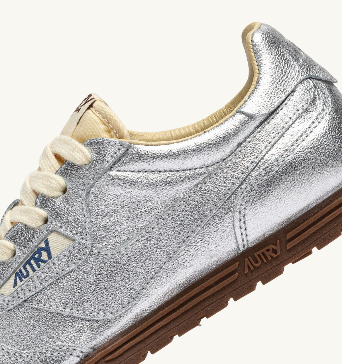 Woman WINDSPIN SNEAKERS IN SILVER TONE LAMINATED LEATHER