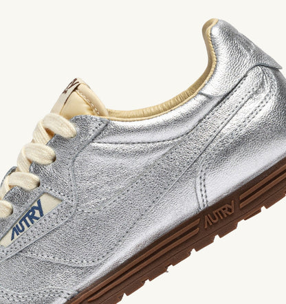 Woman WINDSPIN SNEAKERS IN SILVER TONE LAMINATED LEATHER