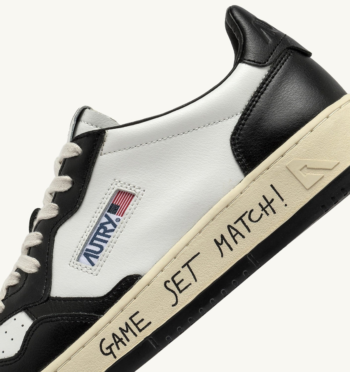 Man MEDALIST LOW SNEAKERS IN WHITE AND BLACK LEATHER WITH LETTERING