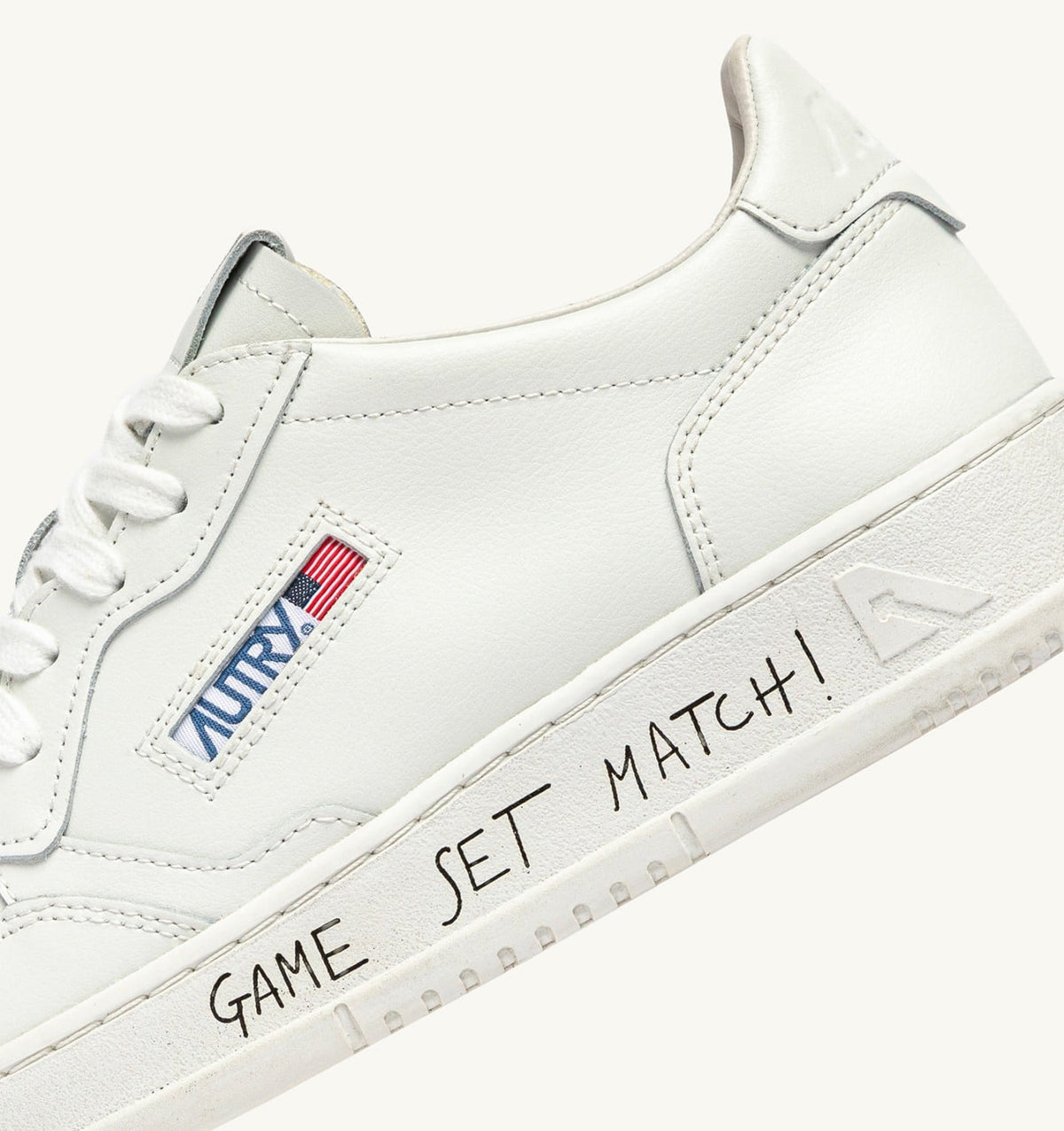 Man MEDALIST LOW SNEAKERS IN WHITE LEATHER WITH LETTERING