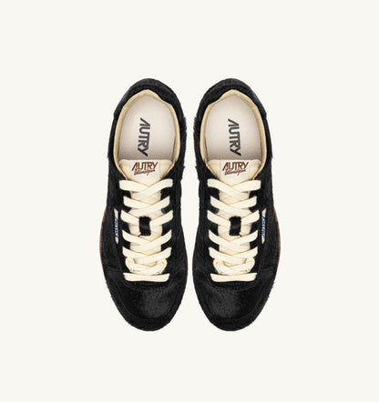Woman WINDSPIN SNEAKERS IN BLACK PONY HAIR EFFECT