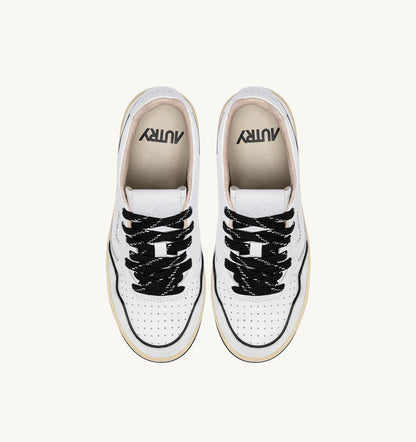 Woman GOLF LOW SNEAKERS IN WHITE AND BLACK LEATHER